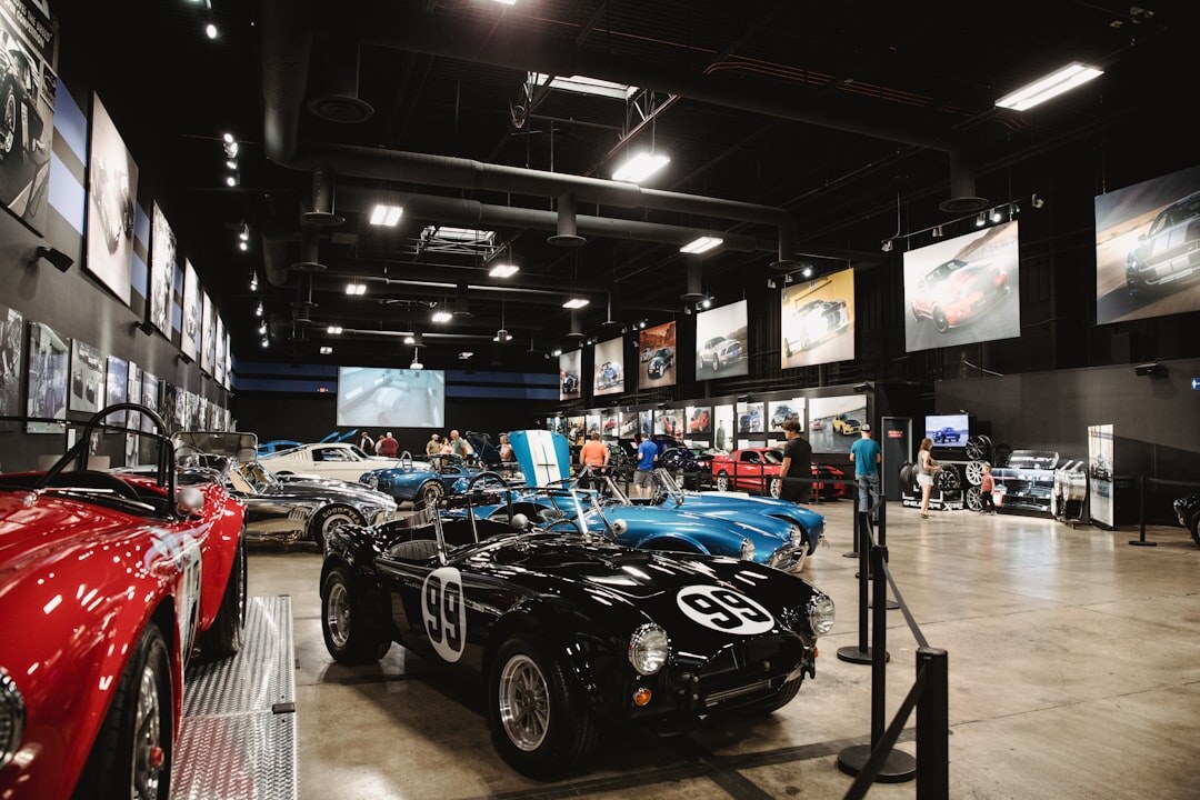 Interior of a classic automobile museum with vintage cars on display